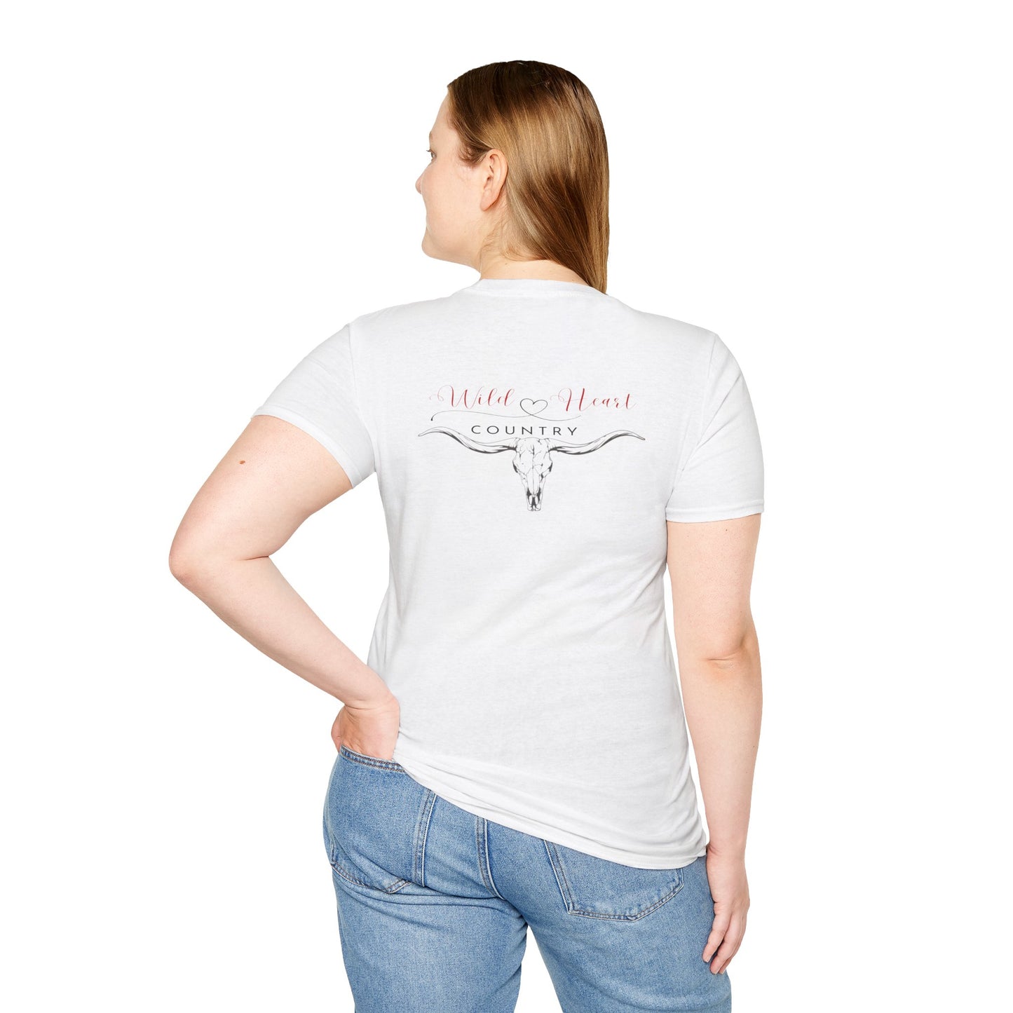 The “Wild Heart” logo, with its cursive script and integrated heart symbol, captures the passion and simplicity of country music. The red color adds a vibrant touch, making the design stand out on the front.
On the back of the t-shirt is the Wild Heart Country logo is featured above a longhorn.