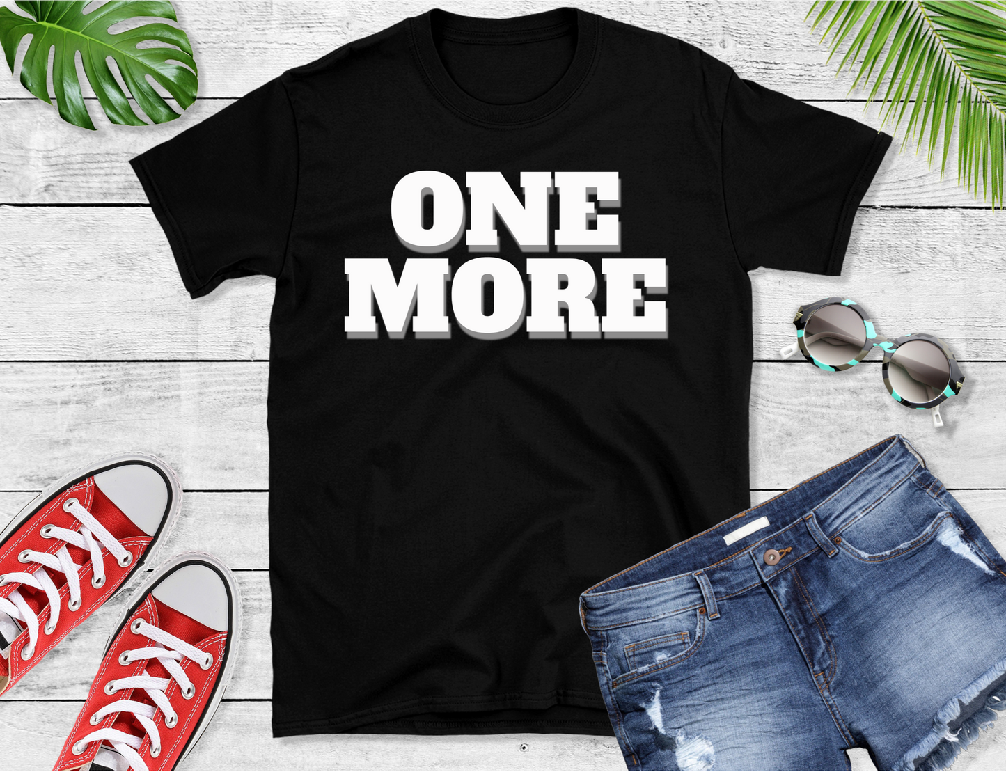 The design features the bold central text “ONE MORE,” across the front of the T-shirt and listed on the back, evocative phrases like “Moonshine Night,” “Midnight Kiss,” and “Sunrise Bonfire.”