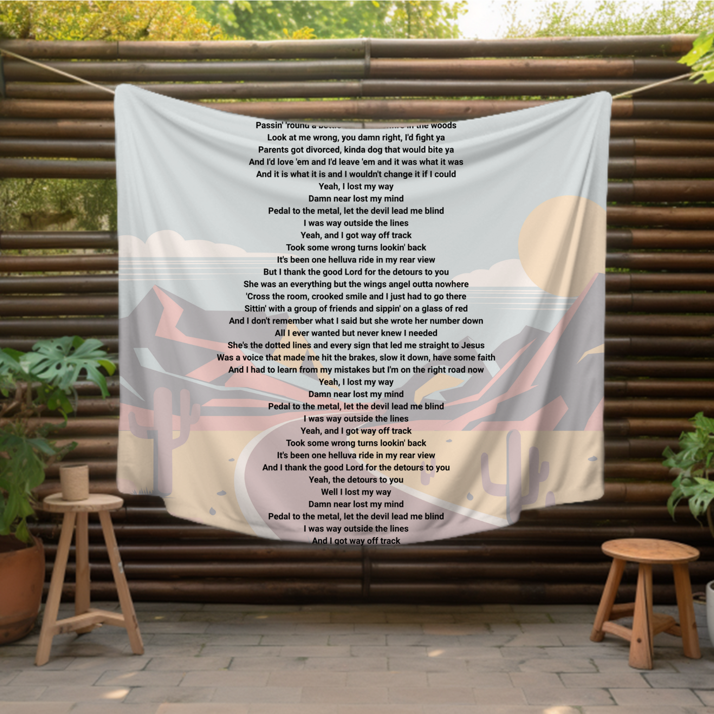 features the full lyrics of the song "Detours" by Jordan Davis, beautifully printed against a serene desert landscape background.