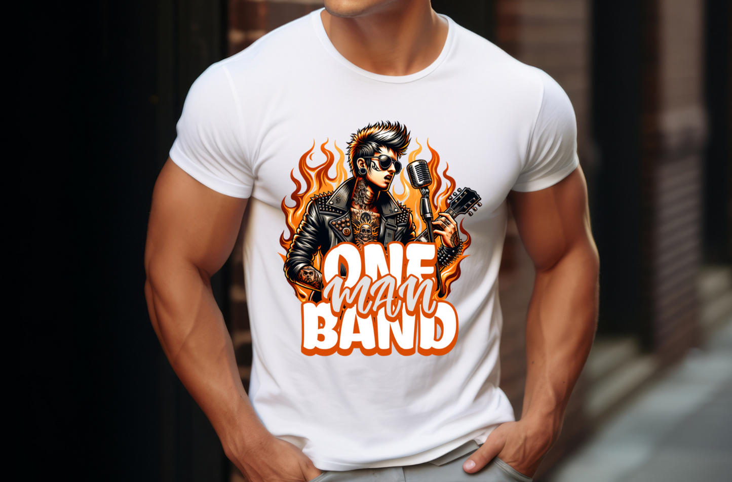 Featuring a dynamic illustration of a solitary musician with a punk rock vibe, this design captures the essence of individuality and musical passion. The musician sports a spiked leather jacket, a striking skull tattoo, and holds a vintage microphone and guitar, all set against a backdrop of dramatic flames. The text "ONE MAN BAND" is boldly displayed in eye-catching white and orange letters