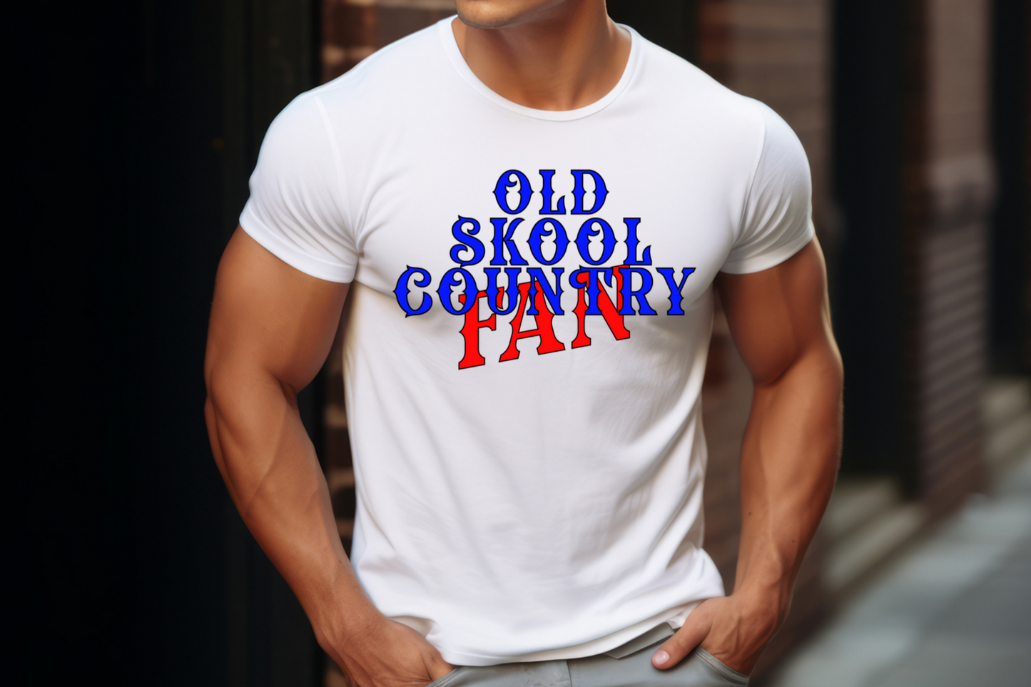 This stylish tee features a bold and eye-catching design with the words "OLD SKOOL COUNTRY FAN" prominently displayed. The text is rendered in a classic, vintage font with "OLD SKOOL COUNTRY" in striking blue and "FAN" in vibrant red, creating a dynamic and visually appealing contrast.