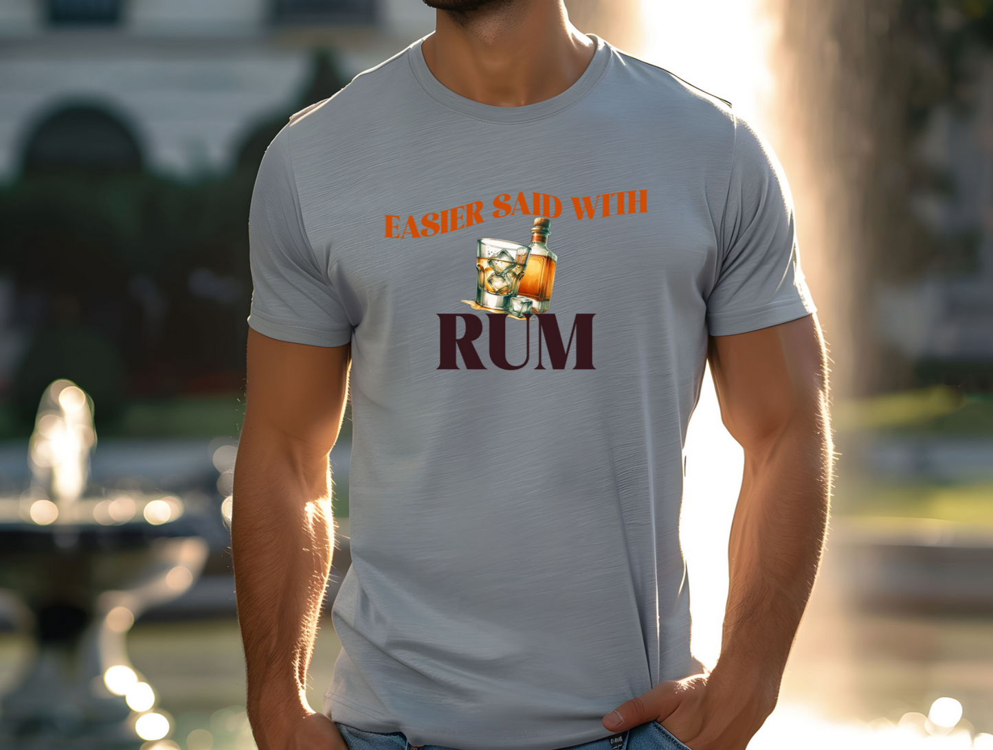 features a vibrant graphic of a glass filled with ice and rum, accompanied by a bottle of rum, perfectly capturing the laid-back, carefree vibe of the song. The bold text "EASIER SAID WITH RUM" arches above the image in a striking orange font, while the word "RUM" is prominently displayed below in a deep, rich brown.