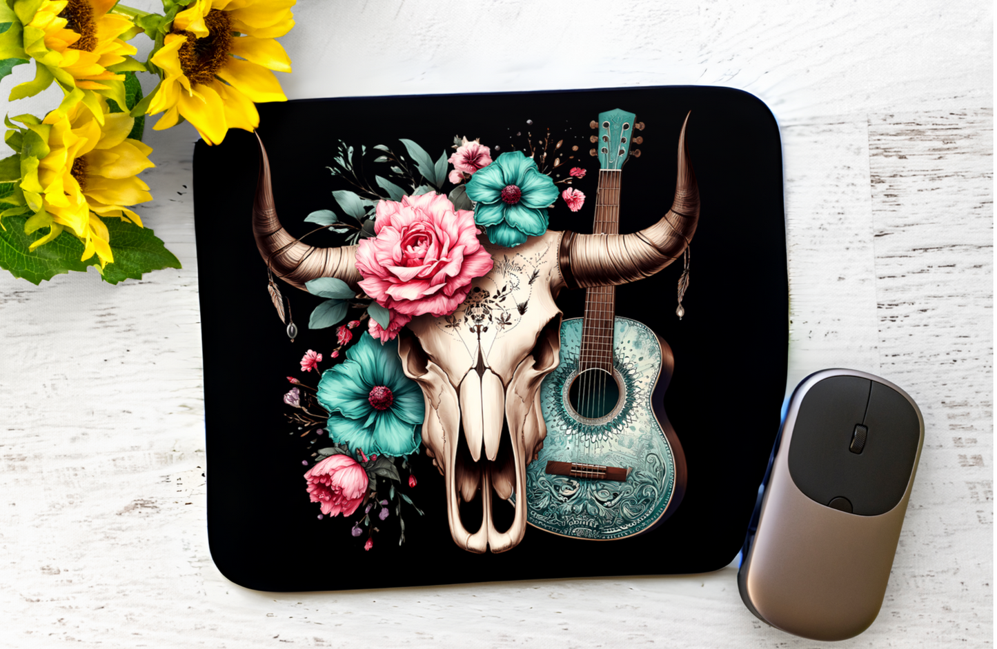 At its heart is a rustic bull skull paired with a turquoise acoustic guitar, beautifully complemented by vibrant floral accents in pink and teal.
