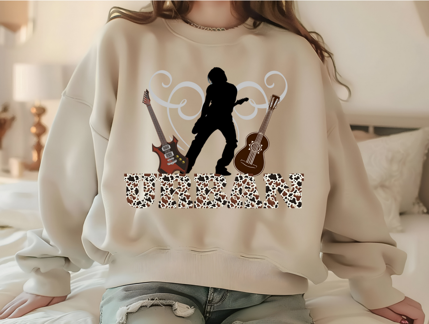 Featuring a bold silhouette of a guitar player in action, this design captures the essence of Keith Urban’s dynamic stage presence. Flanked by two intricately detailed guitars, one electric and one acoustic, it pays homage to Urban’s versatility as an artist. The word “URBAN” is emblazoned across the bottom in a striking font filled with a leopard print pattern