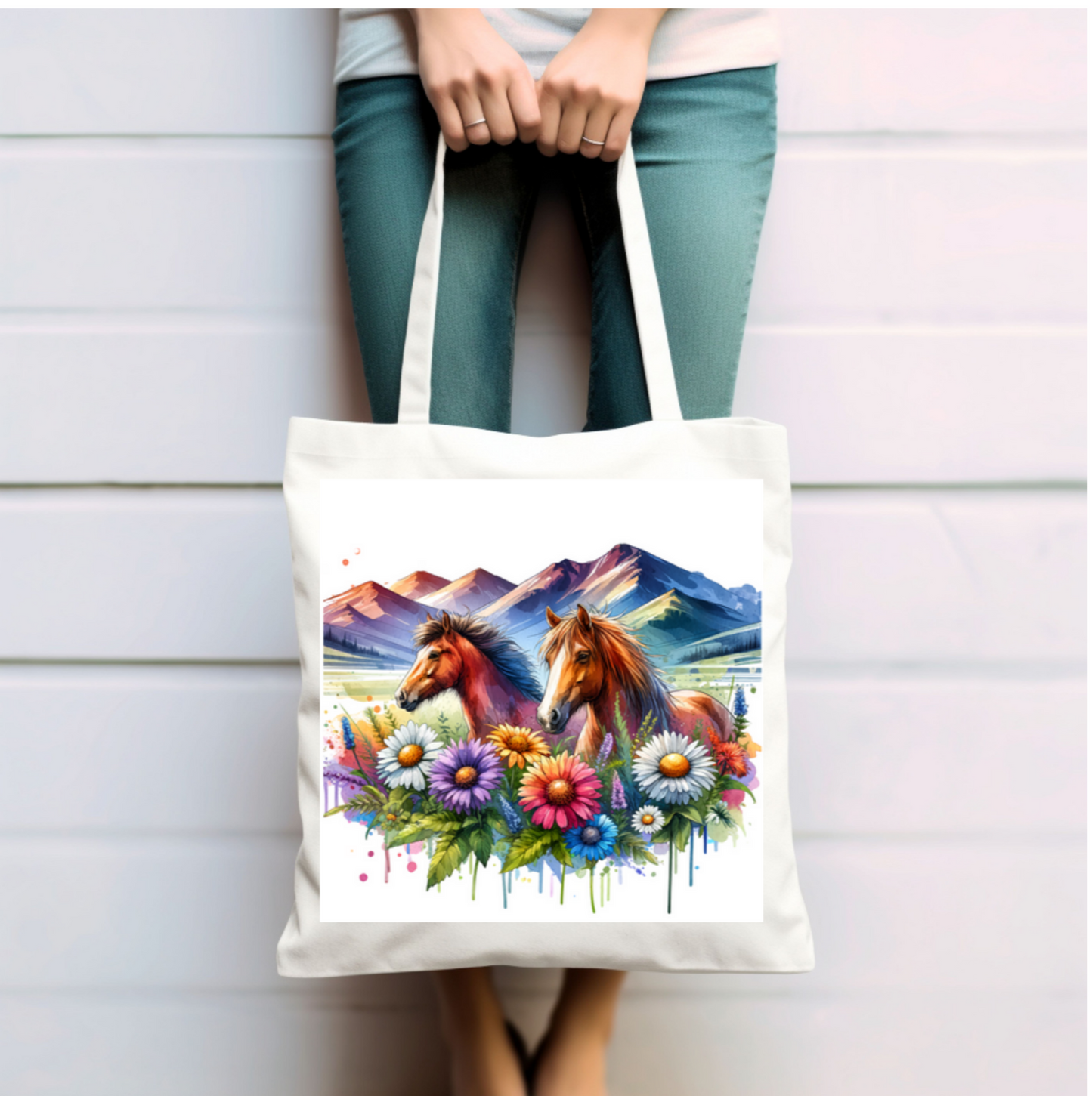 Watercolour picture of two horses with mountains in the background and colourful wildflowers under the horses