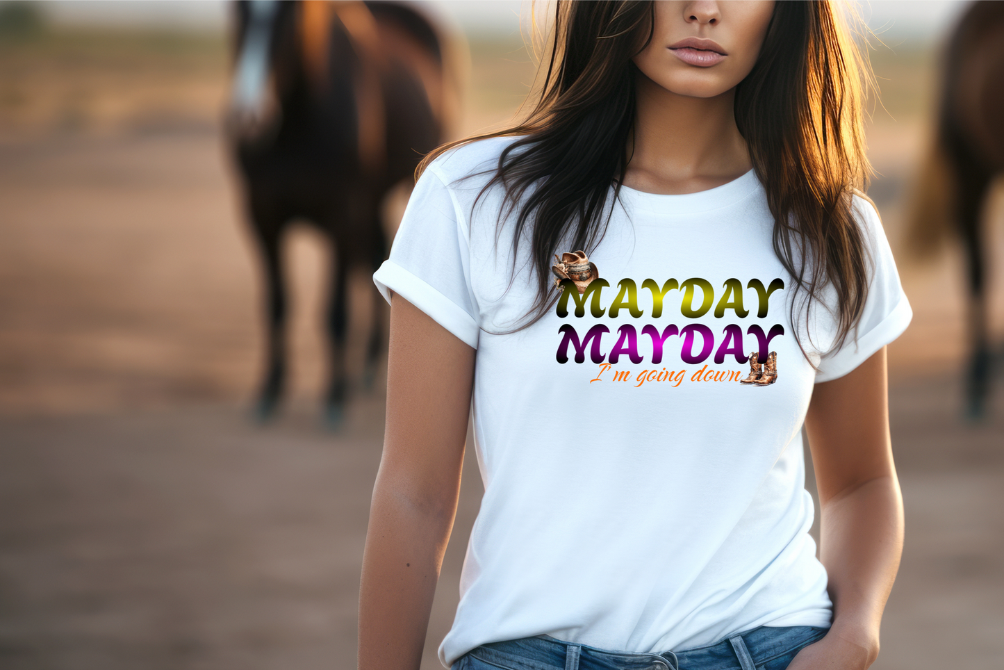 Text "Mayday Mayday in gradient colours of yellow, purple and black. Sitting on top of is a cowboy hat and underneath is a pair of cowboy boot. In orange text under Mayday is I'm going down.
