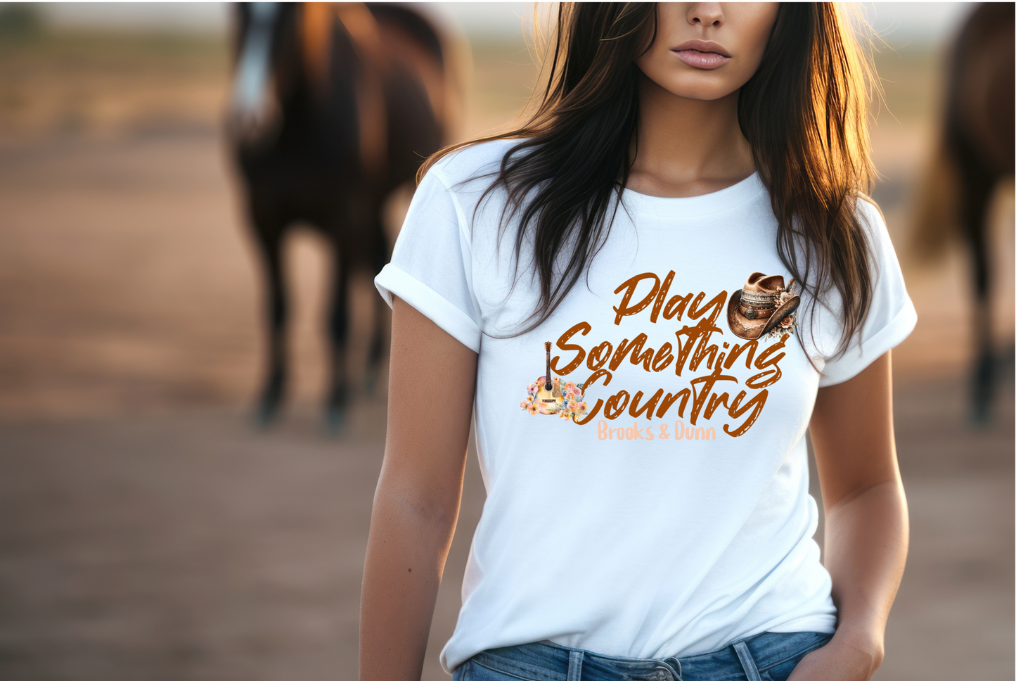 This design features the phrase “Play Something Country” in a bold, cursive font, capturing the casual and artistic vibe of the song. Below the text, the name “Brooks & Dunn”. The design is adorned with a rugged cowboy hat. On the right, an acoustic guitar surrounded by a floral.