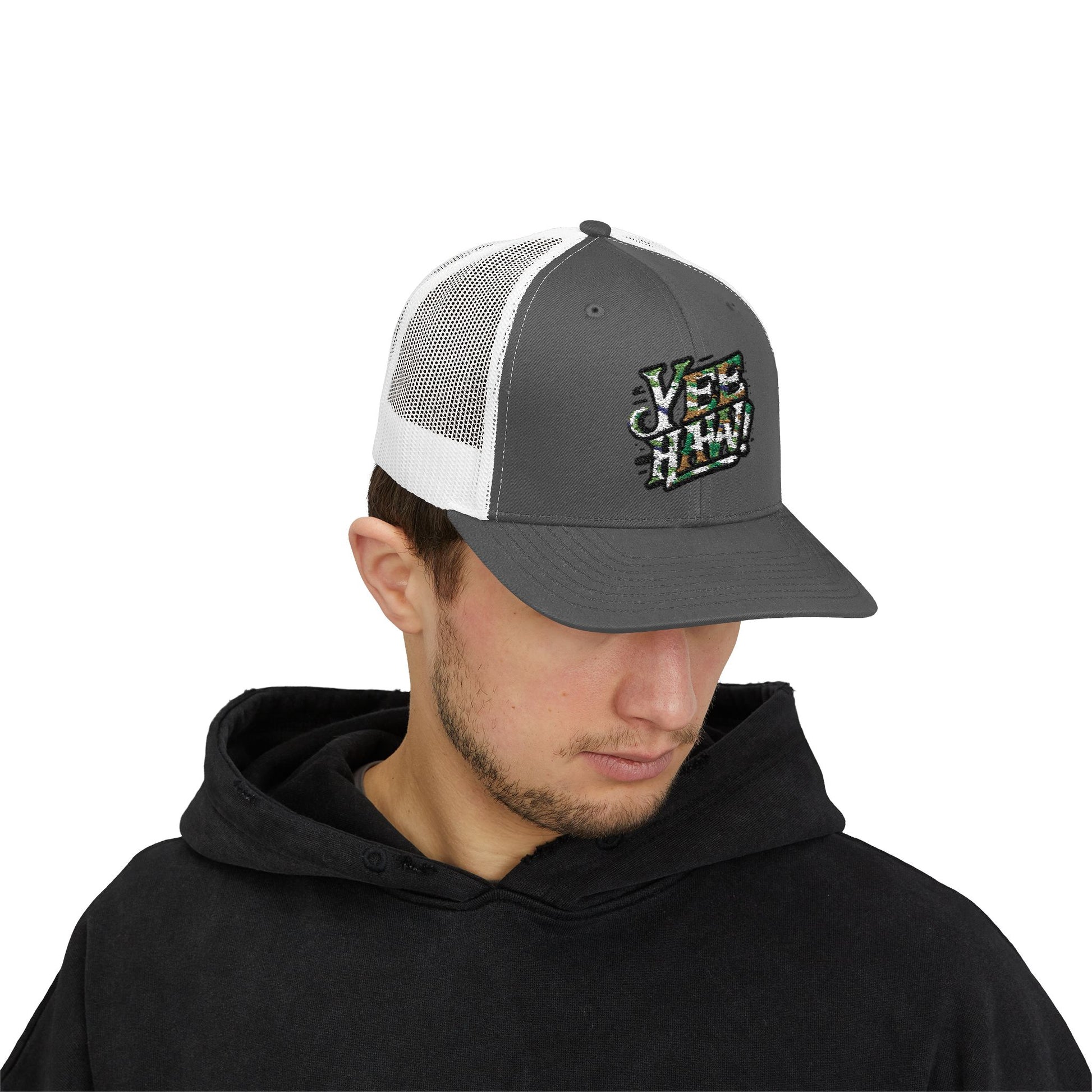 This cap boasts a bold "Yee Haw!" design in large, stylish lettering filled with a classic camouflage pattern in earthy tones of green, brown, and beige.