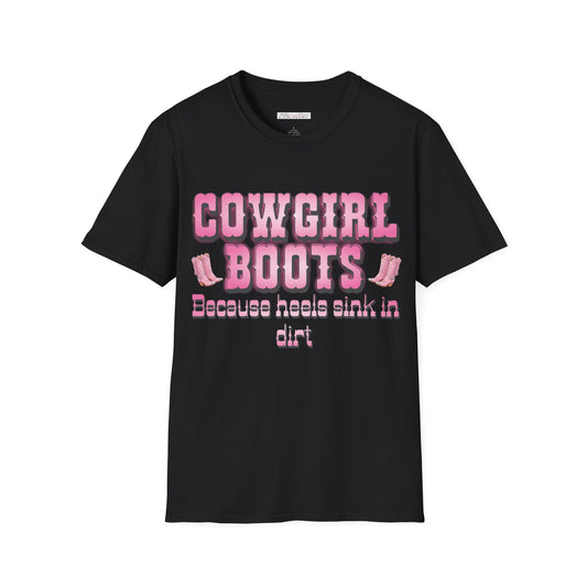 Black t-shirt with pink text 'Cowgirl Boots Because heels sink in dirt' on a white background