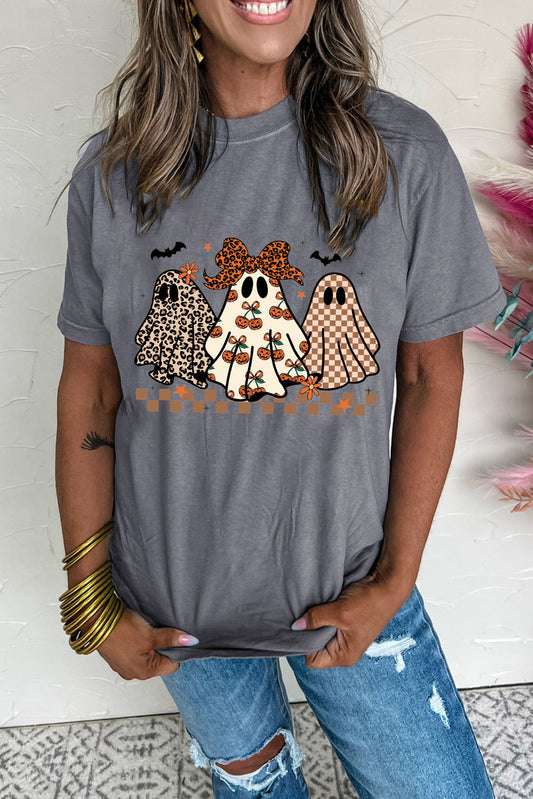 Person wearing a gray t-shirt with ghost designs in leopard print, polka dot, and plain styles.
