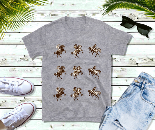 T-shirt showcases a series of nine illustrations, each depicting a cowboy in action on horseback. The cowboys are shown in various poses, from confidently tipping their hats to skillfully handling their reins, capturing the true spirit of cowboy life and the rugged charm of the frontier.