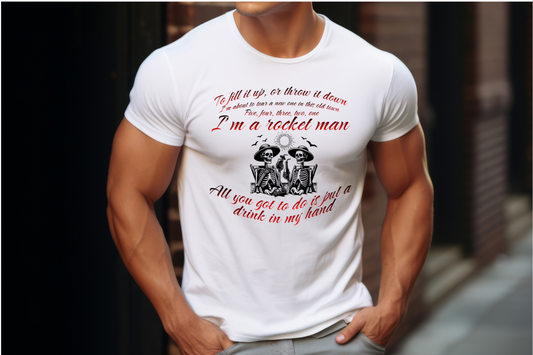 In red and black text are the words to "Drink in my hand", with an image of two skeletons on a beach having a drink