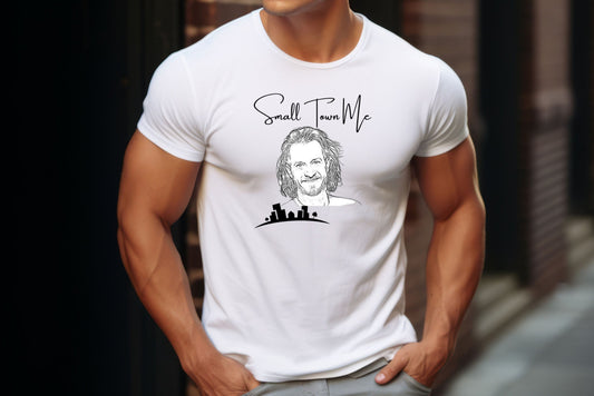 The design features a handwritten script that proudly declares “Small Town Me,” capturing the essence of humble beginnings and personal journeys. Sketched image of Tyler and below, a subtle city skyline silhouette