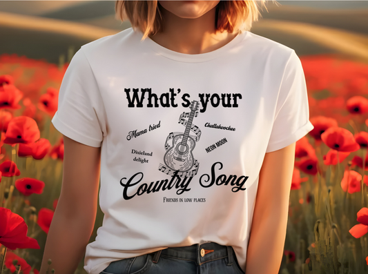 t-shirt features a bold and eye-catching design inspired by Thomas Rhett's hit song "What's Your Country Song." The front of the shirt showcases the phrase "What's your Country Song" in a mix of bold and cursive fonts, with a beautifully detailed guitar illustration in the center