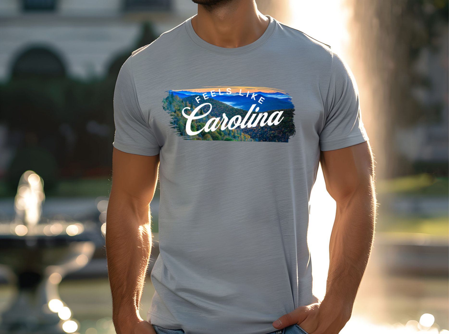 graphic of a tranquil Carolina sunrise, where golden hues blend seamlessly with the serene blue sky, reminiscent of the comforting and nostalgic vibes captured in Parmalee's song. The phrase "FEELS LIKE" arches gracefully above the word "CAROLINA," which is elegantly written in a gentle script