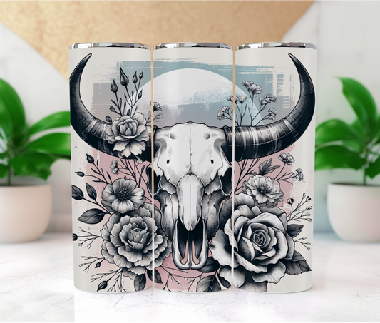 Features a captivating design of a buffalo skull adorned with intricate floral elements. The monochromatic palette of black, white, and pink adds a touch of sophistication to this bold design
