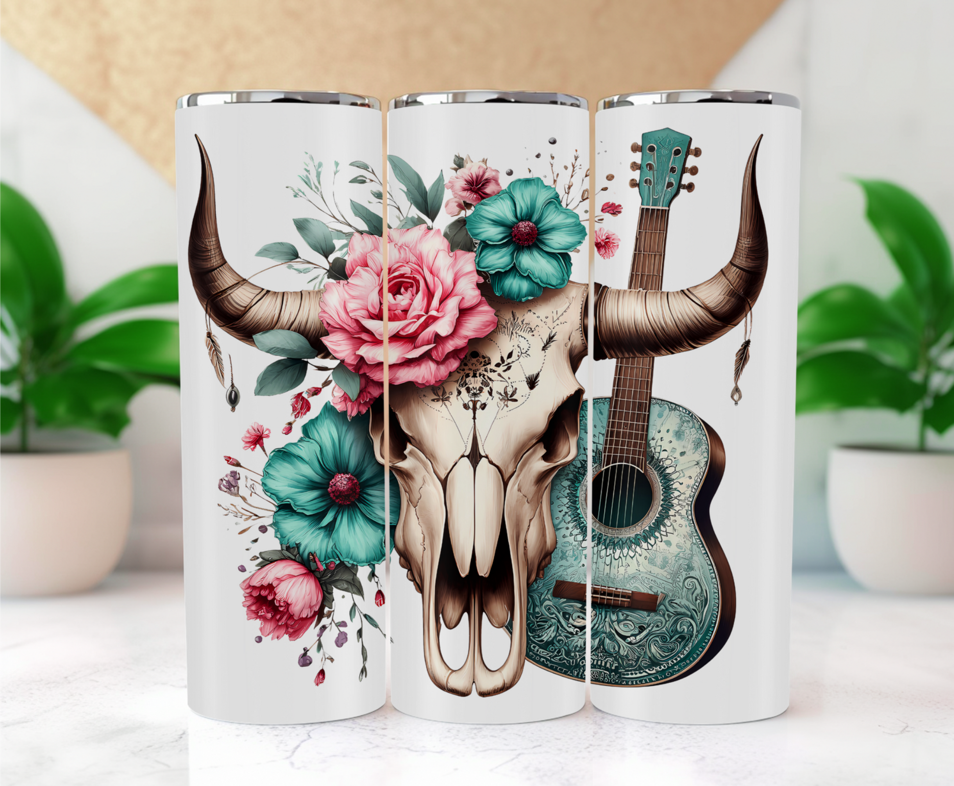Features a majestic bull skull with prominent horns is adorned with vibrant flowers, including large pink roses, teal blooms, and an array of smaller pink and purple flowers, all set against a backdrop of lush green foliage. Leaning against the skull is a turquoise acoustic guitar with intricate designs